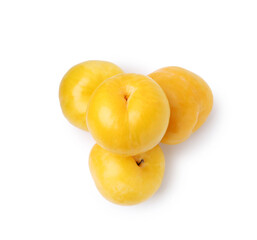 Whole ripe yellow cherry plums isolated on white, top view