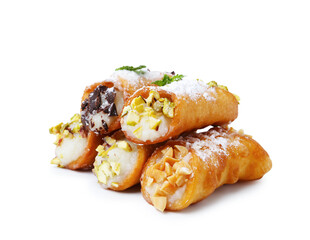 Delicious cannoli with cheese, nuts, powdered sugar, chocolate and mint isolated on white