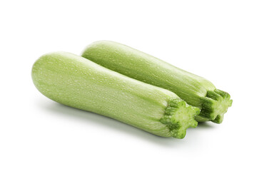 Two fresh ripe zucchinis isolated on white