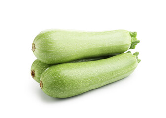 Three fresh ripe zucchinis isolated on white