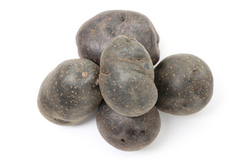 Fresh purple potatoes isolated on white, top view