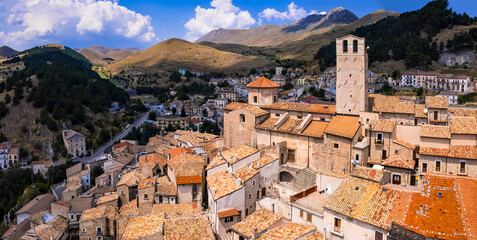 Abruzzo tourism, Italy . The most beautiful italian villages (borgo) Castel del Monte - Located in Gran Sasso mountain range. aerial drone panoramic view of picturesque postcard hilltop town