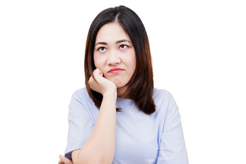 A woman with a thoughtful expression rests her chin on her hand, displaying a mix of contemplation and mild annoyance.