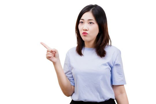 A young woman points with a serious expression, conveying a message or instruction. - Powered by Adobe