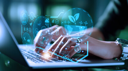 Hands typing on laptop with floating eco icons and green data interface, symbolizing sustainable technology, environmental innovation, carbon footprint monitoring, and digital solutions for climate ac