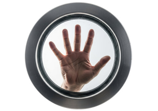 Hand Pressed Against Glass Circular Window
