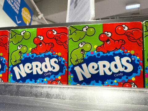 Klagenfurt, Austria - August 20, 2025: Colorful boxes of Nerds candy displayed on a store shelf, showcasing vibrant packaging and playful characters, perfect for sweet treats and nostalgic memories