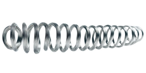 Close-up of a tightly wound metal spring