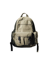 Naklejka premium A light beige backpack with multiple pockets