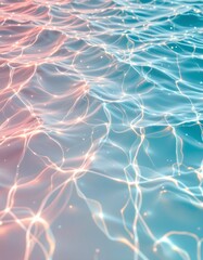 A gradient of soft pastel colors, transitioning smoothly from a gentle peachy pink at the top to a calming aquamarine blue at the bottom, The surface appears to be water