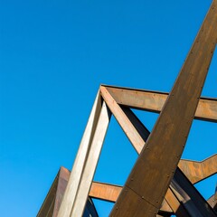 Metal framework against a clear blue sky