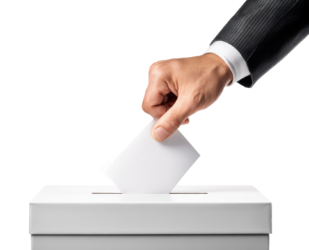 Close-up of a hand in a suit jacket inserting a white ballot into a white ballot box