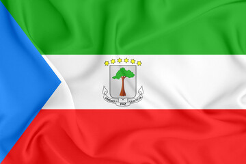 flag with the coat of arms of the Republic of Equatorial Guinea on satin fabric with folds and...