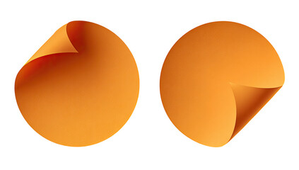 Two orange circular stickers with curled edges