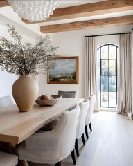 a bright and airy moderntransitional dining room oak wood dining table with sculpted edges upholstered chairs in neutral linen white walls large rustic ceramic .
