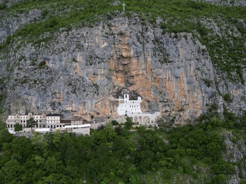 Aerial view of Ostrog Monastery built into the rock face in Montenegro