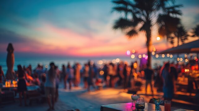 blurred people having sunset beach party in summer vacation  defocused image  concept of nightlife with cocktails and music entertainment no logos no brands ar 169