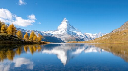 Majestic Mountain Reflection: A breathtaking view of a towering snow-capped mountain reflected in the still waters of a tranquil lake, with vibrant autumn foliage and a bright, cloud-dappled blue sky.