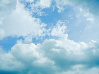 Bright Blue Sky with Fluffy White Clouds