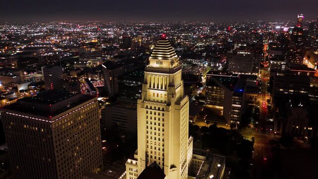 Drone night view of Los Angeles City Hall and downtown skyline, August 10, 2025