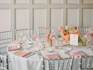 Elegant dining setup featuring floral arrangement and tableware for a special event in a stylish...