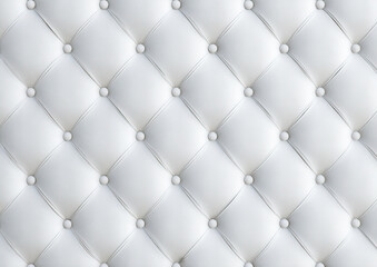Close-up of a white tufted leather or fabric upholstery.  Diamond-shaped tufting with round buttons