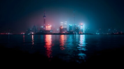 Fototapeta premium Illuminated modern city skyline of Shanghai at night