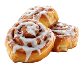 Three freshly baked cinnamon rolls with creamy icing, ready to enjoy.