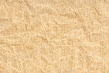 Crumpled Kraft paper texture background. Light brown color