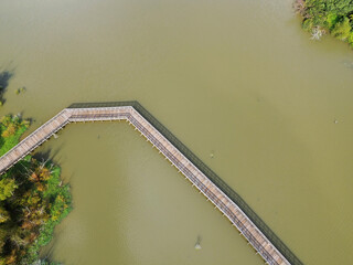 The Crabtree Creek greenway footbridge over water, part of the walking and biking path system in Raleigh North Carolina