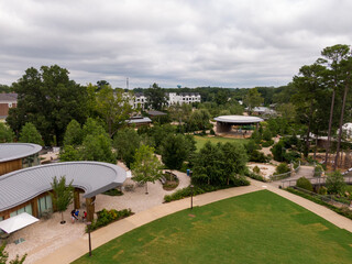 Fototapeta premium Daytime Drone Images of the Downtown Cary North Carolina Park and Surrounding Areas on a Cloudy Day. 