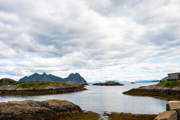 Fototapeta premium Norwegian scenery incluiding mountains and sea 