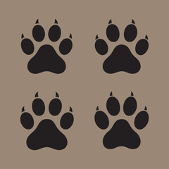 Fototapeta premium Four black paw prints 