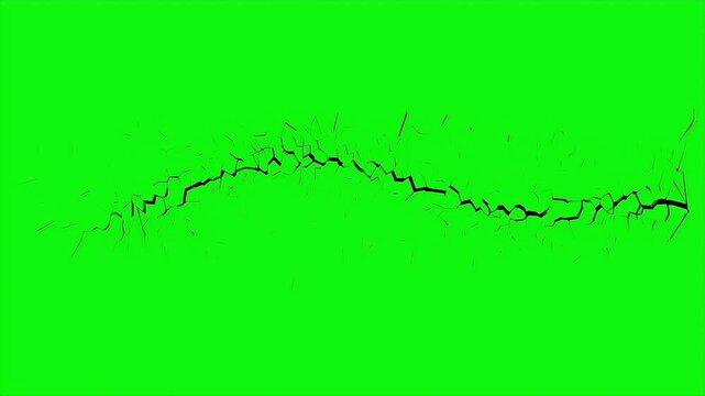 Realistic ground crack spreading on a green screen background for visual effects animation.