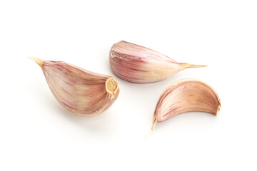 Garlic cloves isolated on white background