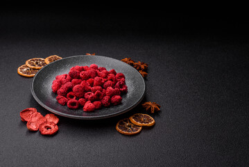 Dried sublimated slices of raspberry as an ingredient for sweet desserts. Dried raspberry