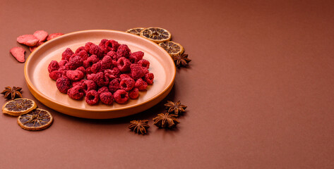 Dried sublimated slices of raspberry as an ingredient for sweet desserts. Dried raspberry