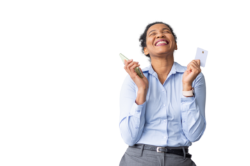 Smiling businesswoman celebrating financial victory, waving cash and credit card against clean white backdrop