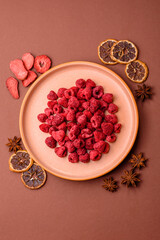 Dried sublimated slices of raspberry as an ingredient for sweet desserts. Dried raspberry
