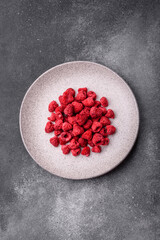 Dried sublimated slices of raspberry as an ingredient for sweet desserts. Dried raspberry