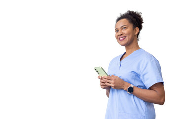 Happy female doctor wearing blue scrubs holding smartphone and smiling while looking away on...