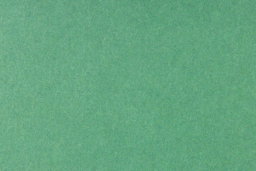 Green offset printed paper background texture. Macro close up. Full frame