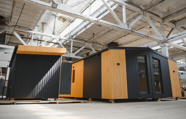 Obraz premium A new wooden modular prefabricated house inside in manufacturing facility