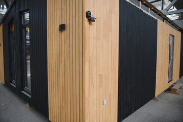A new wooden modular prefabricated house inside in manufacturing facility