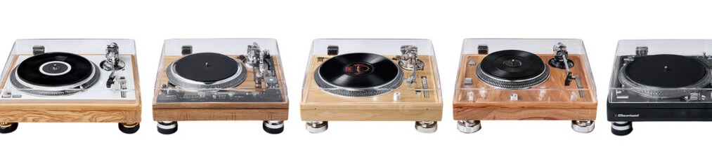 Fototapeta premium Four vintage record players with light-colored wooden housings