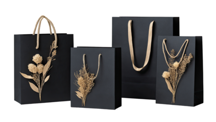 Four dark gray gift bags, each featuring a pressed flower arrangement in muted beige and tan