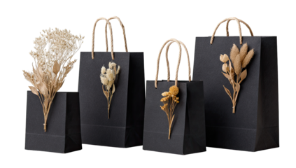 Four dark gray gift bags, each featuring a different arrangement of dried flowers