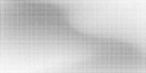 Fototapeta premium Dotted halftone gradient texture. Fading polka dot background. Repeated dots gradation pattern background. Black vanishing comic pop art overlay backdrop. Halftone raster effect wallpaper. Vector