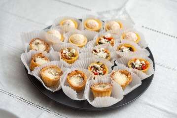 Assorted mini appetizer platter display