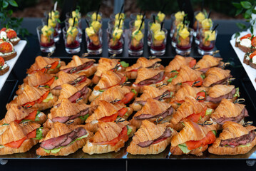 Gourmet croissant sandwiches display